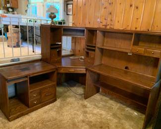 #020	Wood/Laminate Corner Desk Unit - separates into 5 pieces (for moving purposes) - 74-87x22Dx30-60T - w/10 Drawers  - You Move	 $75.00 