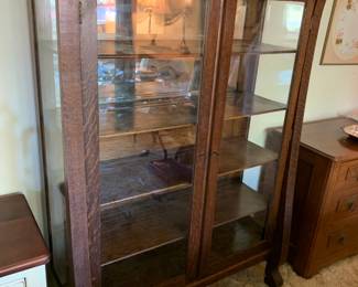 #065	Tiger Oak Primitive China/display Cabinet w/2 glass doors and sides with Mirror Back w/4 shelves - 46x17x64	 $325.00 