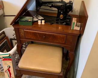 #078	Black Singer Sewing Machine w/attachments in a cabinet w/stool and contents	 $60.00 
