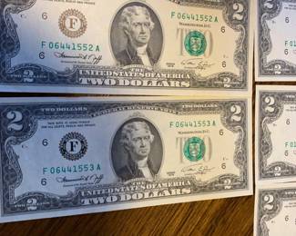 #138	1976 Bicentennial $2 Bills Uncirculated   - as a set	 $50.00 