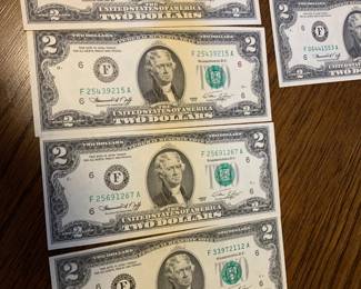 #138	1976 Bicentennial $2 Bills Uncirculated   - as a set	 $50.00 