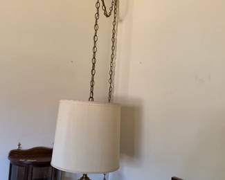 #062	Hanging Mid-Century 2 light Brass Lamp w/chain	 $75.00 