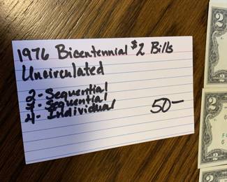 #138	1976 Bicentennial $2 Bills Uncirculated   - as a set	 $50.00 