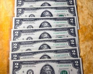 Another set of consecutive two dollar bills