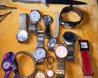 Collection of watches and a knife