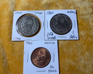Two silver and one copper pesos