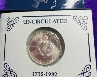 Uncirculated and a proof 250th anniversary of the birth of George Washington half dollar silver