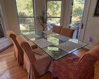 GLASS TOP TABLE AND 6 CHAIRS