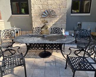 PATIO TABLE AND 6 CHAIRS
