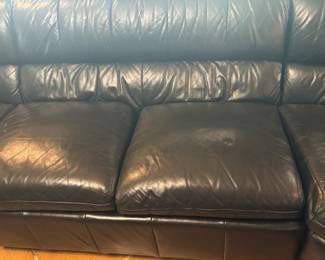 DETAIL OF THE. BLACK SECTIONAL BY LEATHERCRAFT