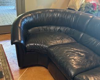 DETAIL OF THE BLACK LEATHER SECTIONAL BY LEATHERCRAFT