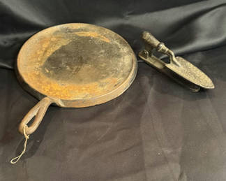 Lot 162: Cast Iron Pieces