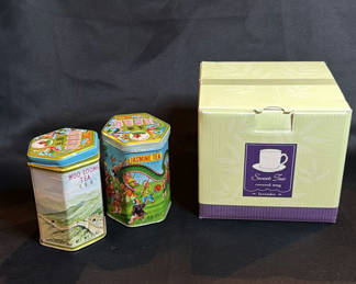 Lot 109: Ready for a Cuppa? Two Tea Tins and Covered Tea Mug Set