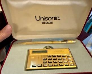 Vintage Unisonic calculator and matching pen w/ clock in case