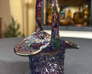 Fenton purple iridescent carnival glass top hat basket featuring a Daisy and Button pattern