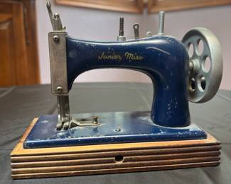 VINTAGE Blue Junior Miss toy sewing machine made by Artcraft Metal Products
