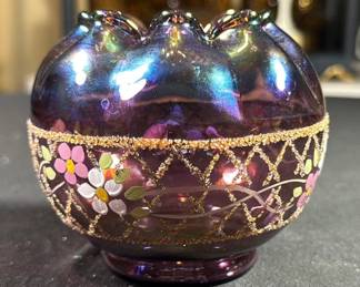 Fenton Plum Carnival Glass Rose Bowl from 1995, featuring a hand-painted floral design with an iridescent purple finish and raised gold lattice accents