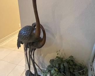 BRONZE  ABOUT 4 FT -ITS A THING A VERY COOL THING 