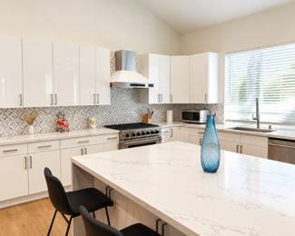 Bright Modern Kitchen with Blue Vase