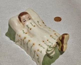 Ceramic Boy in Bed Figure