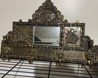 Antique Brass Wall Mounted Mirror & coat/Hat Rack (ships & lion heads),