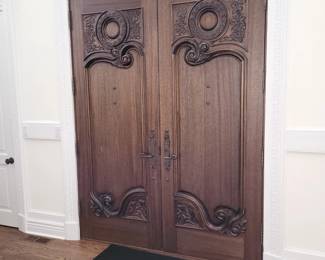 $3,650.00. Hand-carved mahogany double entry doors with ornate bronze hardware. Oversized Hand-Carved Double Entry Doors – 75" W × 100" H × 2¼" Thick
