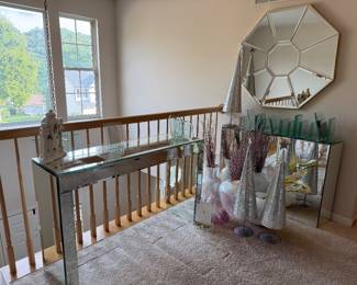 Lots of mirrored furniture