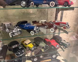 Large collection of diecast cars with the boxes