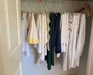 many vintage tablecloths