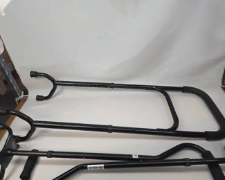 2 Four-Prong Metal Canes and a "Rocksteady" Cane