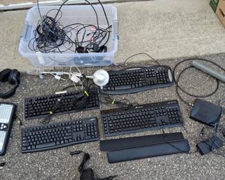 Assorted Computer Keyboards, Headphones, Cables, and Accessories Collection