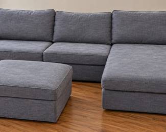 Dark Grey Sectional Sofa with Chaise Lounge and Matching Footstool