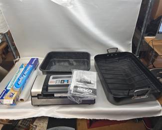 Like New Nesco Food Vacuum Sealer, 2 Large Roasting Pans, and Freezer/Parchment Paper