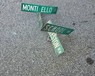Lot of Street Signs - Monticello, School, Huddleston, East 13th St