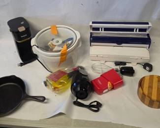 Variety of Household Kitchenwares - Vacuum Sealing, Lodge Cast Iron Pan, and More