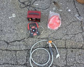 Century Battery Charger & Milwaukee 100 ft Tape Measure Lot