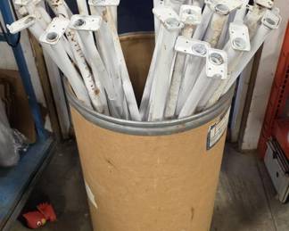 Barrel of White Metal Closet Rods