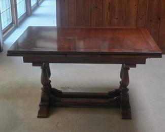 Beautiful Vintage Extendable Wood Dining Table with Trestle Base & Fold-Out Leaves