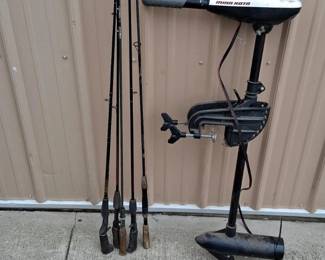 Assorted Fishing Equipment Collection with Rods, Trolling Motor, Winch, and Fish Basket