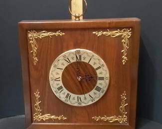 Mid Century Square Wooden Wall Clock Featuring A White Roman Numeral Dial And Gold Corner Accents – Potterville