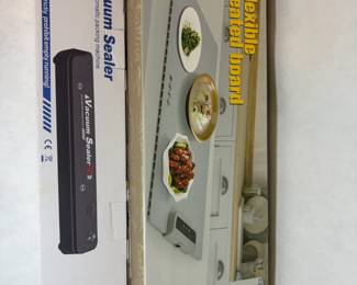 White Automatic Vacuum Sealer and Blue Flexible Heating Mat