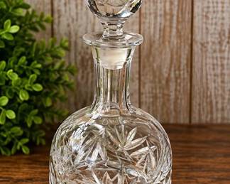 Vintage Heavy Cut-Crystal Liquor Decanter With A Starburst Pattern And Faceted Ball Stopper