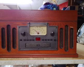 Retro Crosley Musician Center With Turntable, CD, Cassette, And Bluetooth In A Classic Wood Design