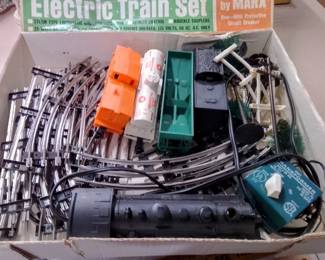 Louis Marx & Co. Electric Train Set With Original Box, Locomotive, Cars, Track, And Transformer