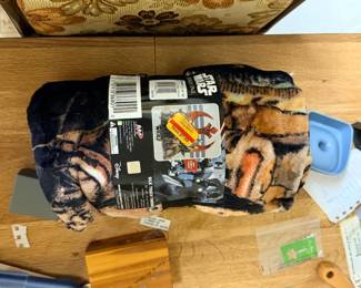 Vintage sofa & new-in-package Star Wars Rogue One throw