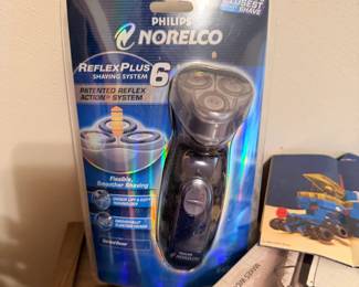 Sealed Philips Norelco shaver, vintage boxed personal-care items