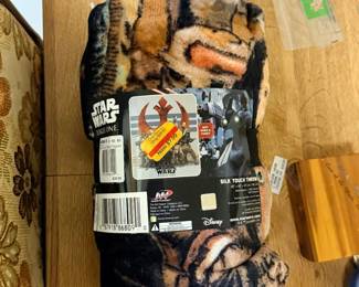 Vintage sofa & new-in-package Star Wars Rogue One throw