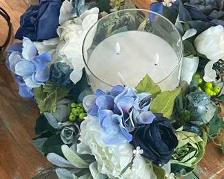beautiful blue flowers and large battery operated candle