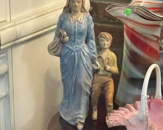 woman and boy figurine