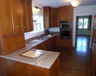 Autumn Woods Custom Quarter-Sawn Oak Kitchen Cabinets + Stone Counters, Full Set. $5,900.00.
